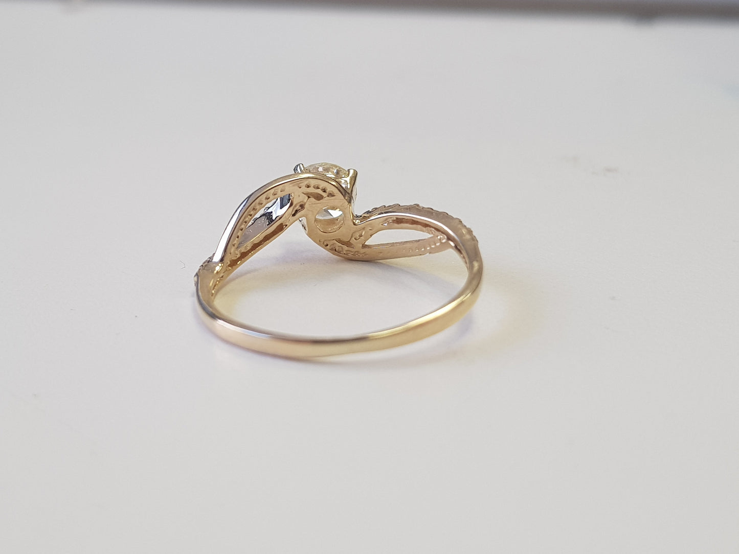 twisted yellow gold diamond engagement