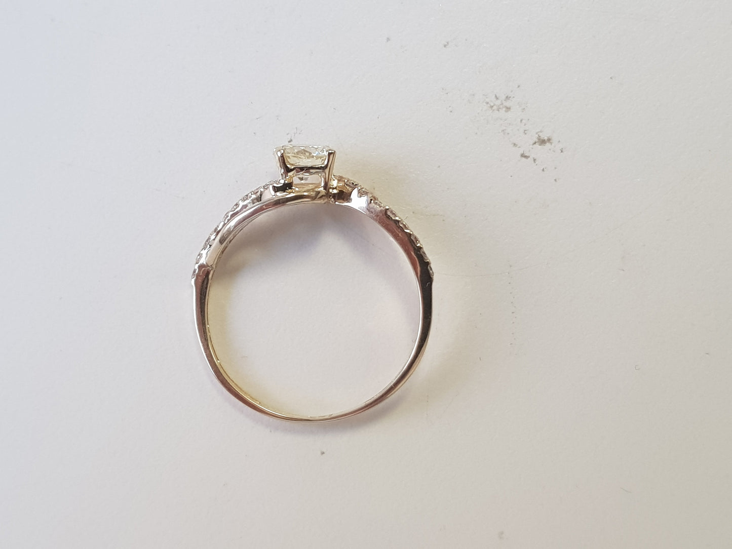side pic of yellow gold diamond ring